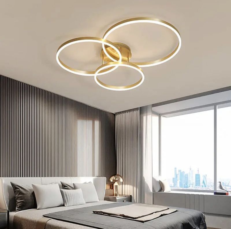 Золота стельова LED люстра Anelli на 3 кільця