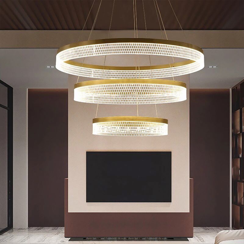 Дизайнерська золота LED люстра на 3 кільця