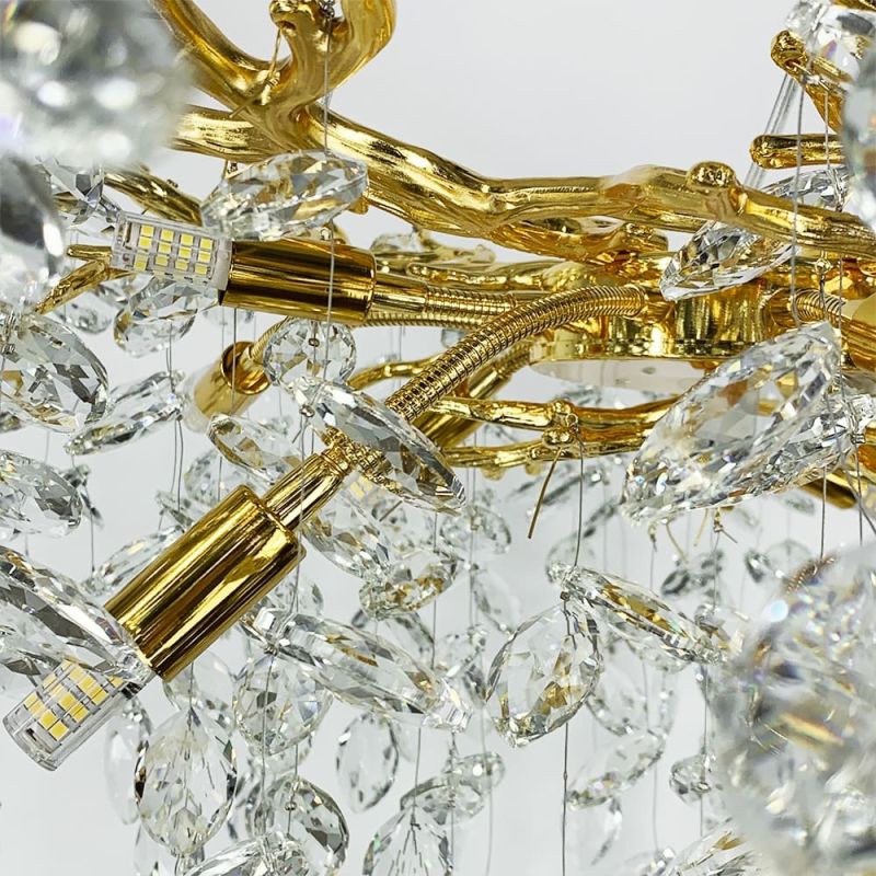 Вишукана золота люстра DIAMINA з кришталевим камінням Ø 60 см