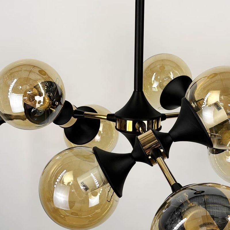 Люстра в чорному корпусі з золотом на 9 янтарних плафонів 