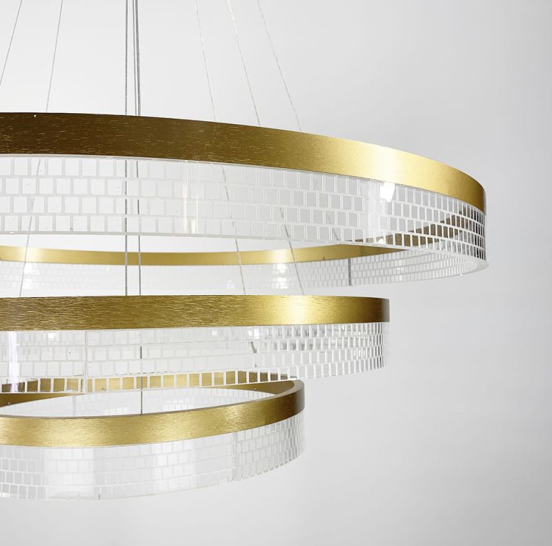 Дизайнерська золота LED люстра на 3 кільця