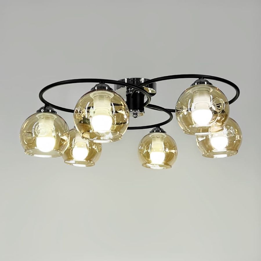 Стельова чорна люстра-орбіта на 6 янтарних плафонів Ø 60 см