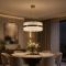 Підвісна латунна люстра із циліндричними скляними елементами Ø50 см