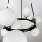 Люстра кругла в чорному корпусі з білими плафонами