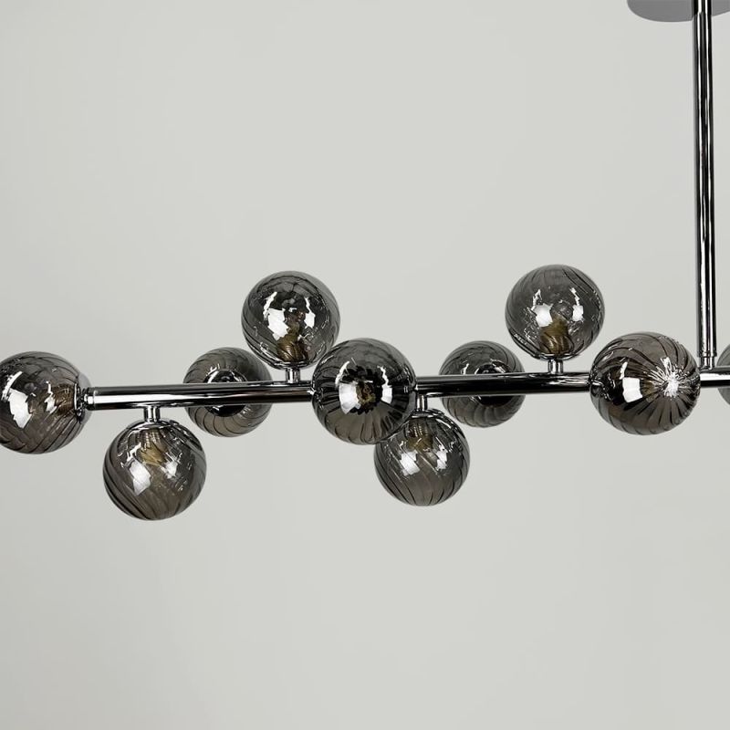 Видовжена люстра із серії Arte Lamp Bolla у корпусі 120 см